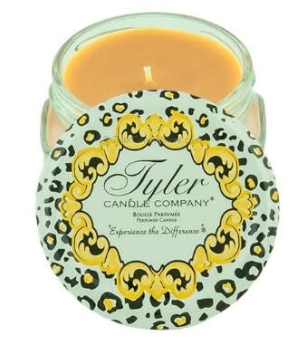 Tyler Candle Company 3.4oz candle in a glass jar with a leopard print lid and gold frame design.