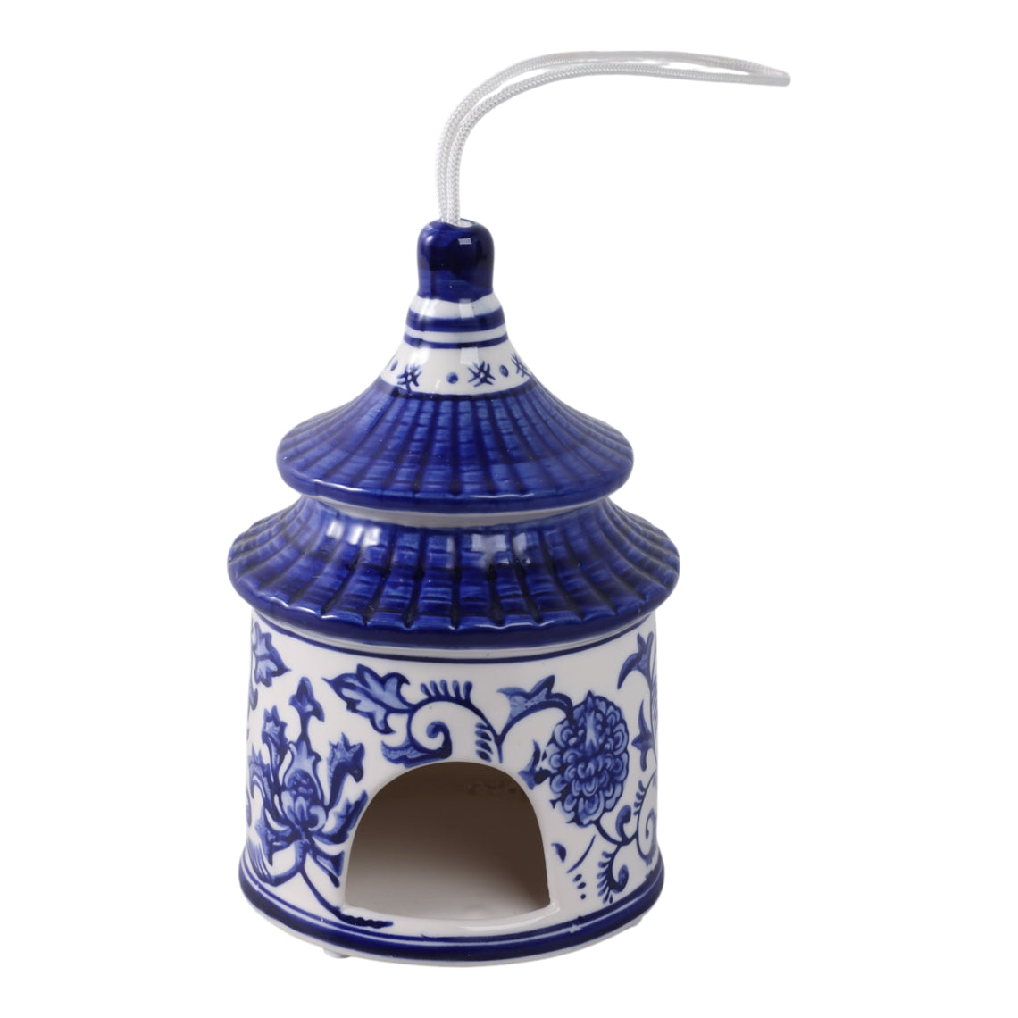 White and blue ceramic chinoiserie pagoda bird house with floral patterns and a hanging cord.