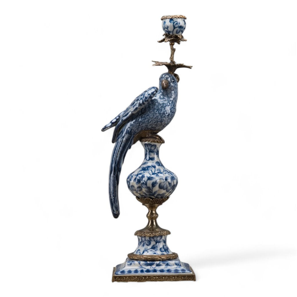 Blue and white porcelain parrot candle holder with bronze ormolu accents on a square base.