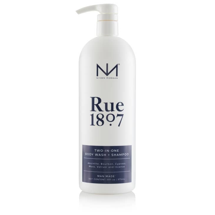 Bottle of Rue 1807 Body Wash and Shampoo XL in a clear container with white liquid.