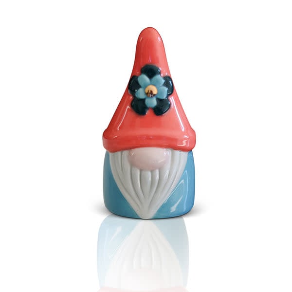 Mini garden gnome figurine with a whimsical hat, standing on a small base.