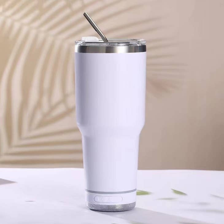 Stainless steel tumbler with detachable Bluetooth speaker; silver finish.