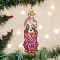 Spa Dog ornament: a small figurine wrapped in a towel with cucumber eyes and a zen design.