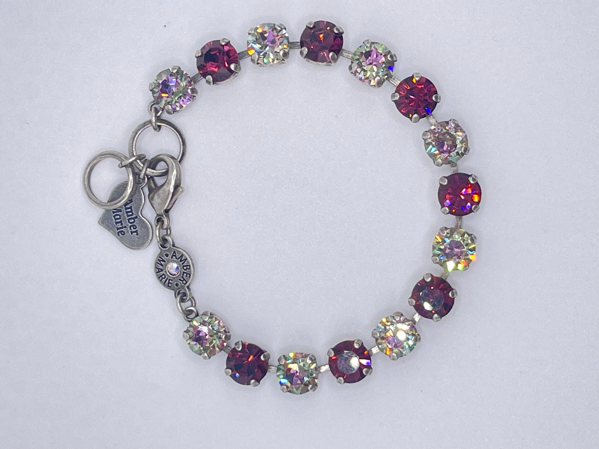 Milan classic bracelet featuring a sleek silver-tone metal band with an adjustable chain closure.