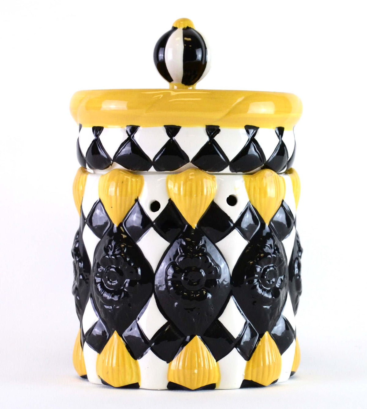 Gold metallic fragrance warmer with a radiant diva-shaped silhouette.