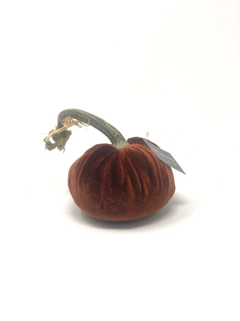 Handmade orange velvet pumpkin with a natural stem.