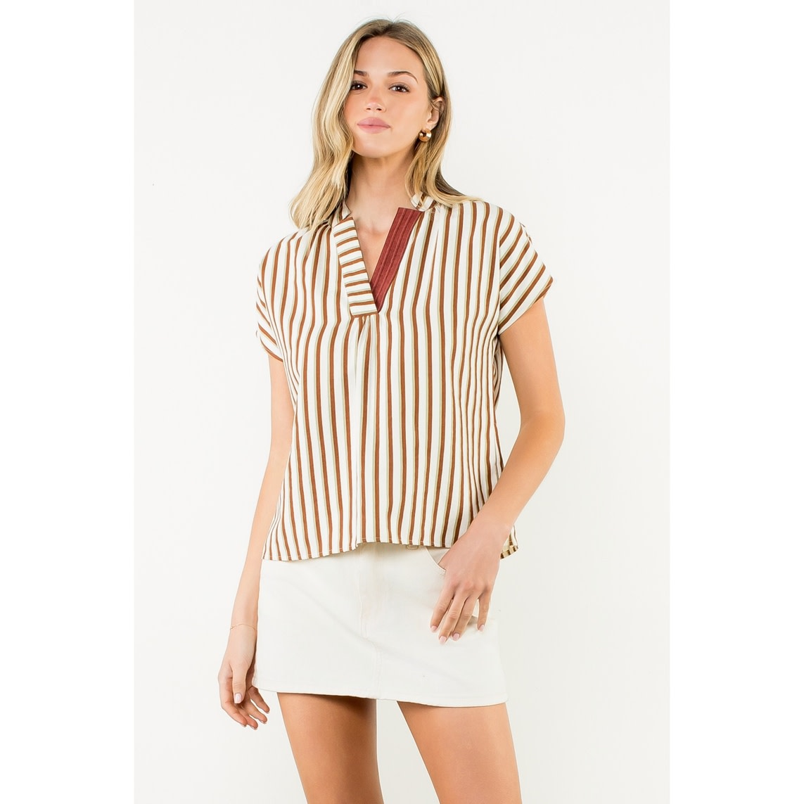 Cassie Contrast V-Neck striped woven top in black with white trim and v-neck silhouette