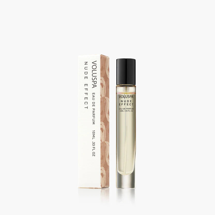 Bottle of Nude Effect Eau De Parfum in a clear glass container with nude-colored liquid and minimalist label.