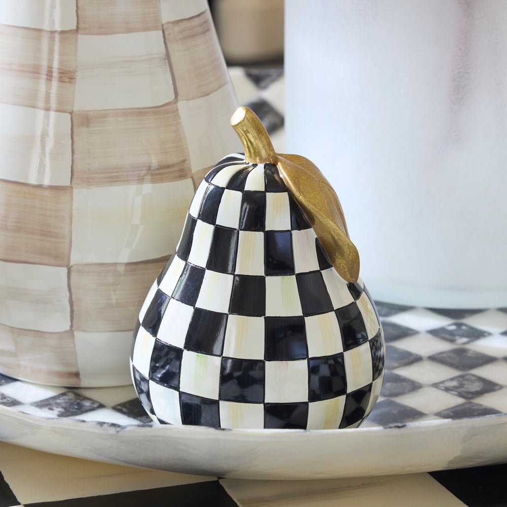 Hand-painted resin pear with gold leaf accents on a courtly check pattern background.