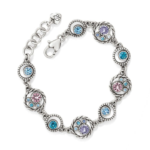 Silver-plated adjustable halo bracelet featuring a central tanzanite crystal with fine quality crystals.