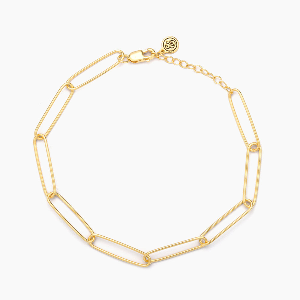 Paperclip chain bracelet in gold-plated sterling silver with a lobster clasp closure.
