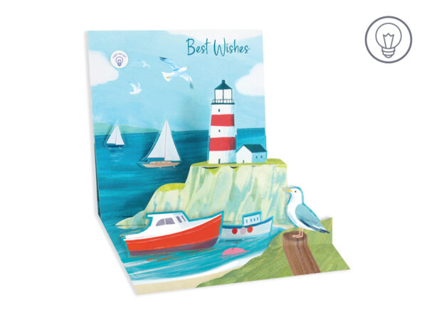 White envelope with teal foil finish featuring a lighthouse illustration.