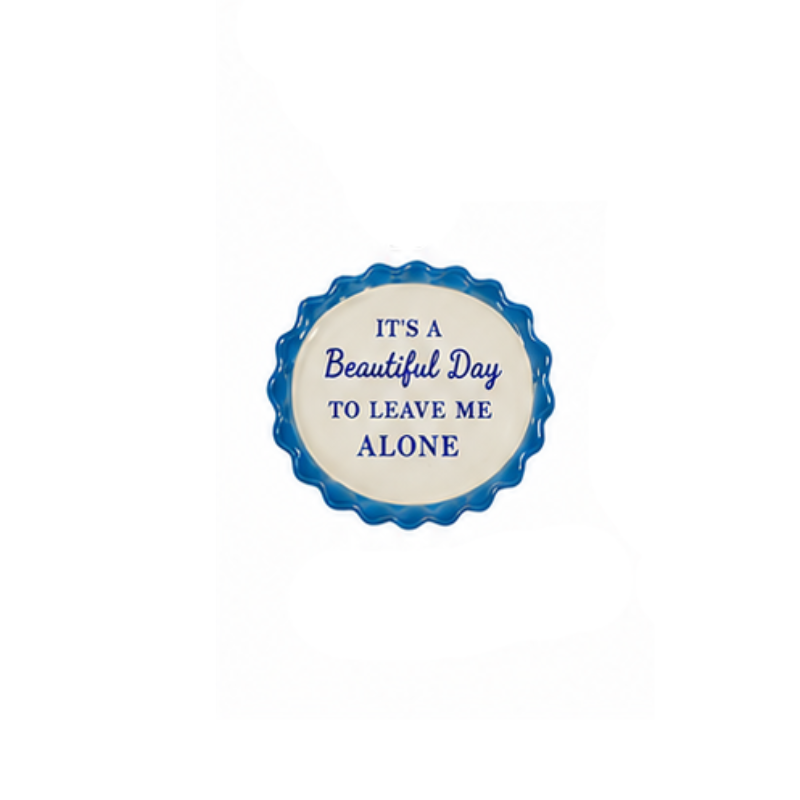 Round stoneware magnet with blue scalloped edge and text: IT'S A Beautiful Day TO LEAVE ME ALONE.