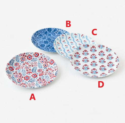 Americana paper plate with patriotic red, white, and blue stars pattern.