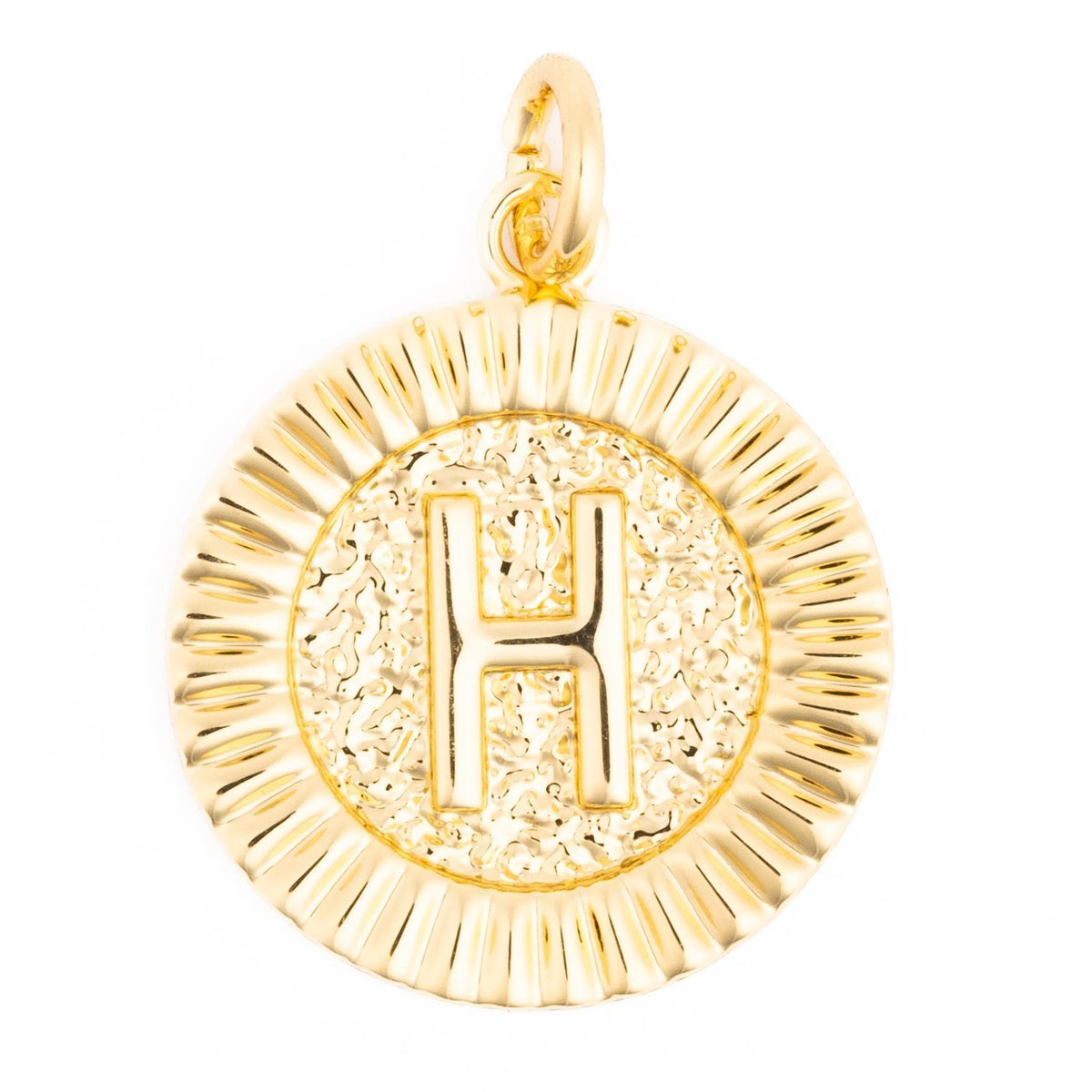 Gold round McKenna charm featuring a raised letter H on a textured background with a fluted border.