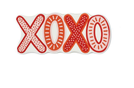 White attachment with red and orange XOXO letters, featuring dotted and striped patterns.