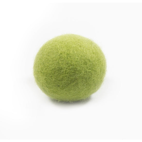 Single white eco dryer ball with textured surface