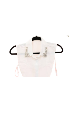 White detachable faux collar with crystal embellishments on the points, shown on a black hanger.