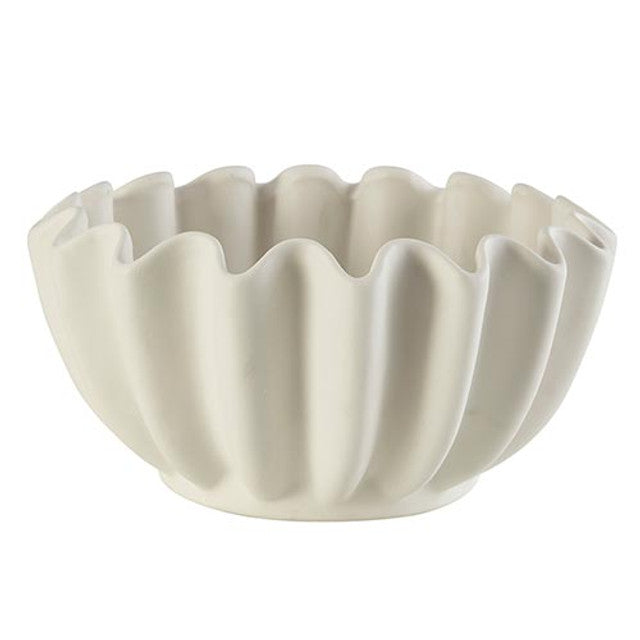 Coral porcelain bowl with a smooth round silhouette.