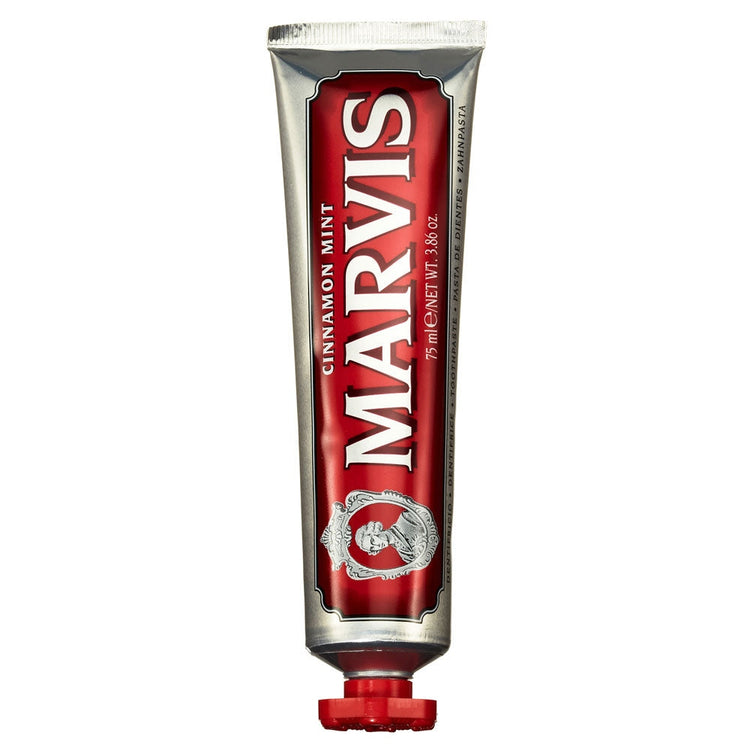 Marvis Cinnamon Mint Toothpaste in a 75ml silver and red tube with a red cap.