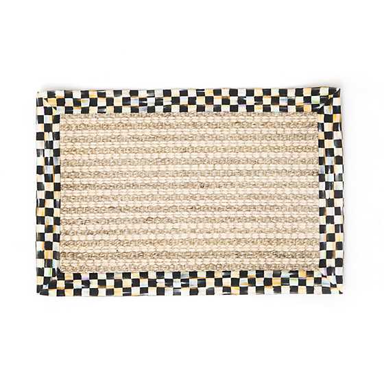 Rectangular wool and sisal rug with a natural woven center and a black and white checkered border.