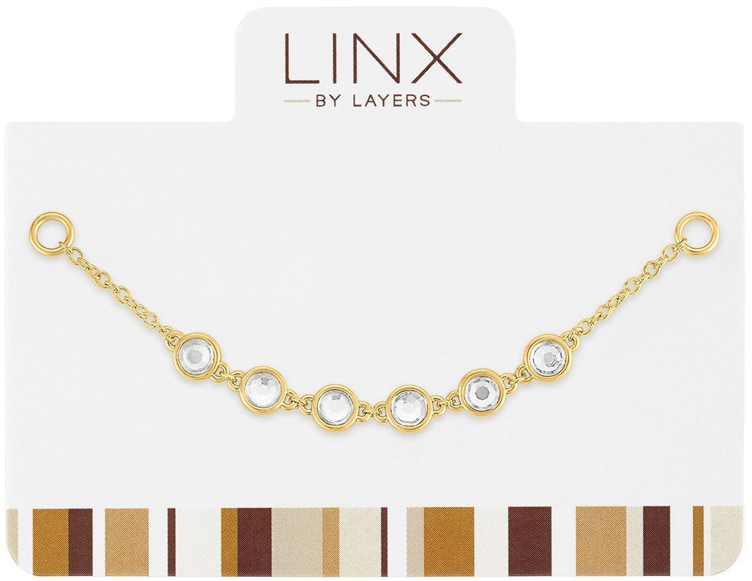 Gold chain LINX add-on featuring six round clear crystals in gold bezels on a white card.