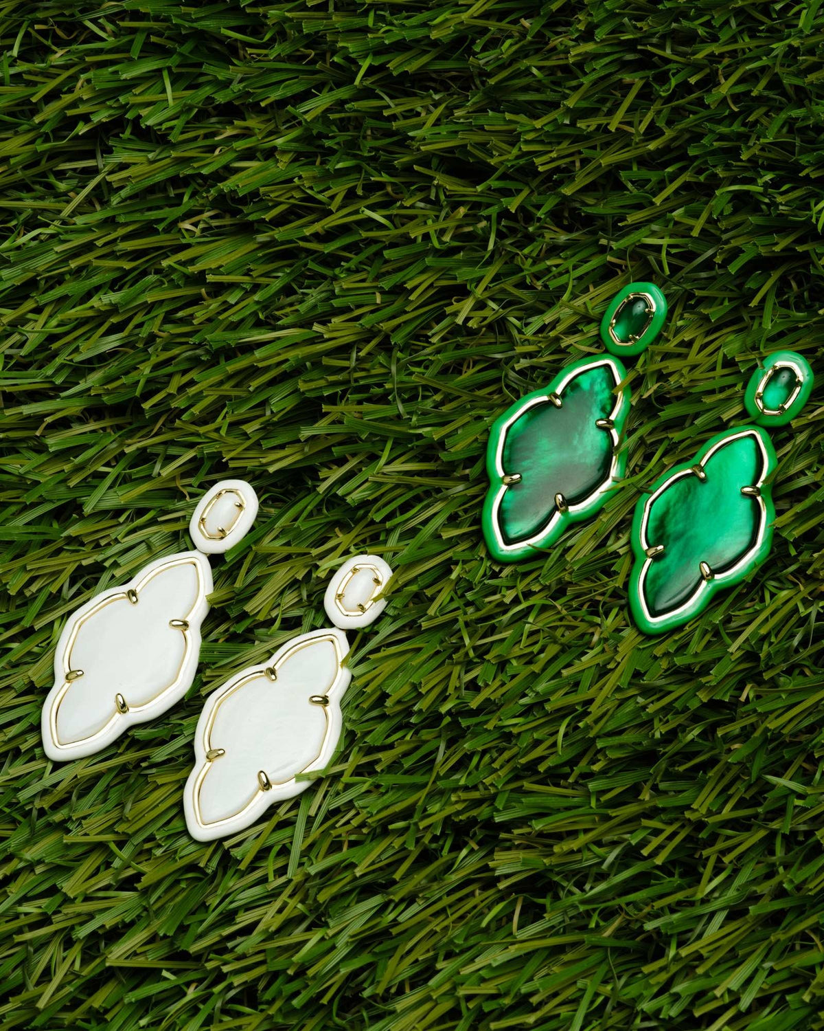 Gold frame statement earrings with hand-painted enamel accents matching the central stone.