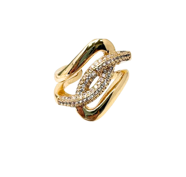 Gold fashion statement ring with a chunky intertwined link design and pavé crystal accents.
