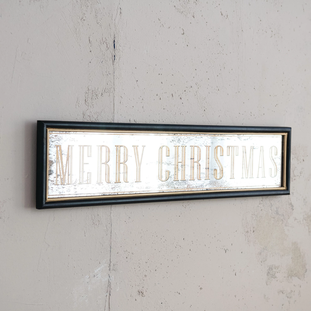 Horizontal MDF wall décor with a black frame and antiqued mirror featuring "Merry Christmas".