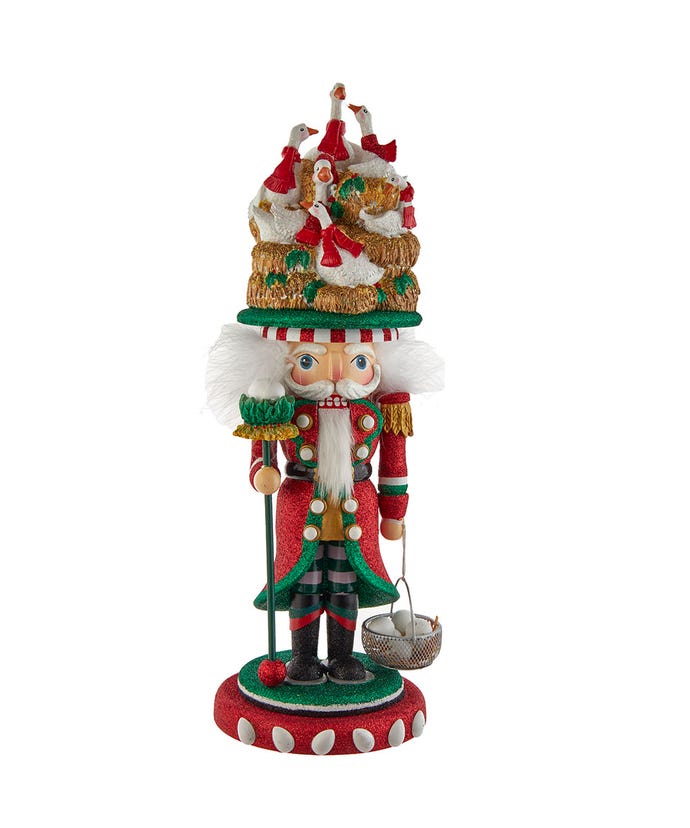 18-inch Hollywood Nutcracker featuring six geese a-laying on its hat and holding a basket of eggs.