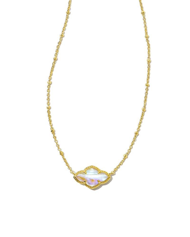 Abbie Pendant Necklace on an elongated chain with a medallion silhouette in gold-tone finish.