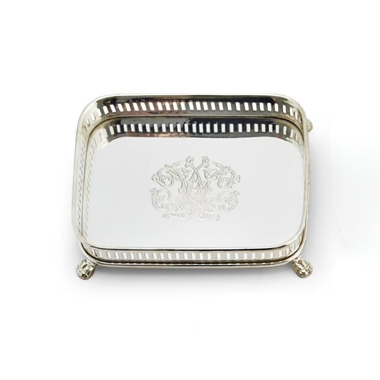 Silver-plated brass Galway gallery tray with engraved center design and footed base.