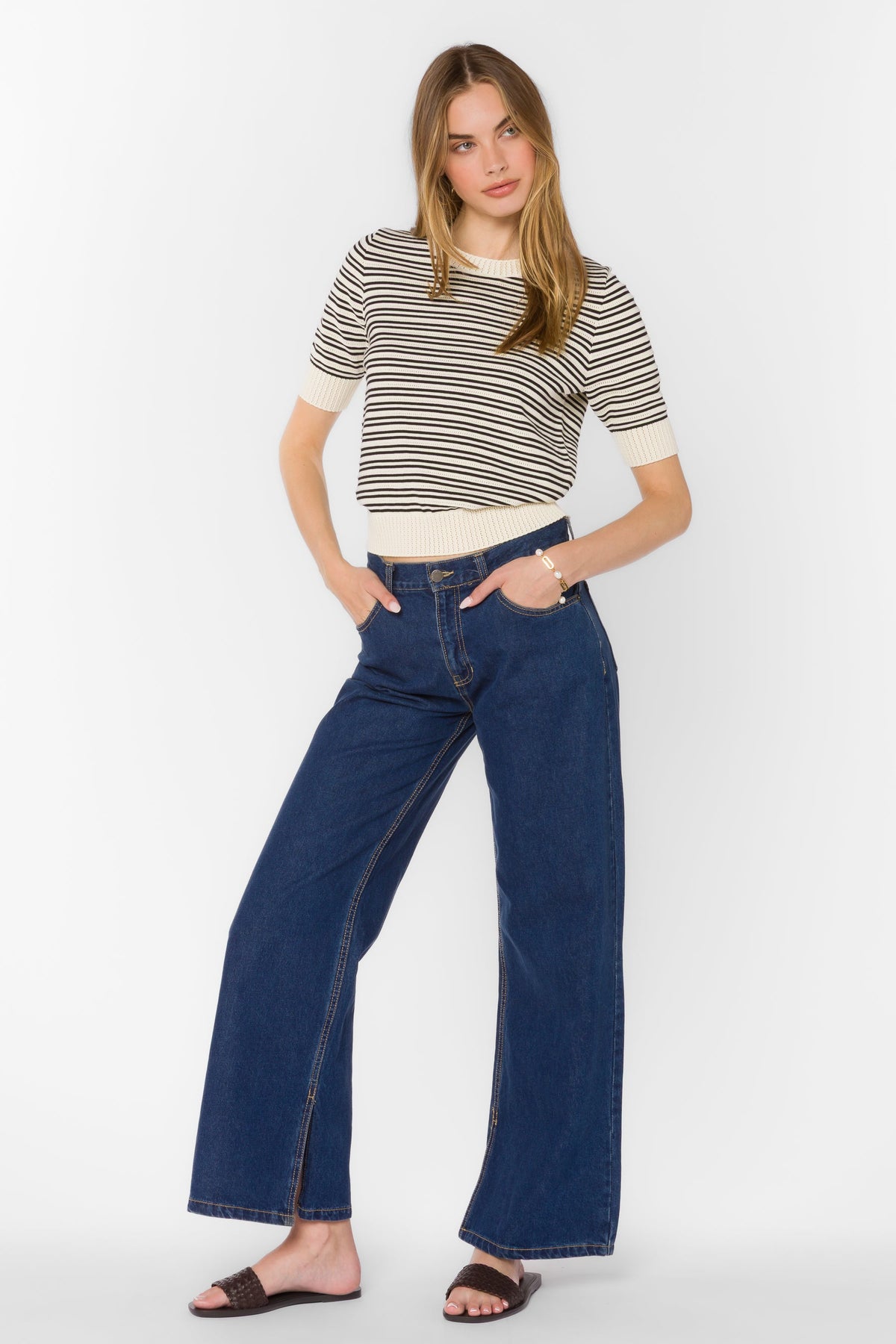 Norine Stripe Sweater in white cotton with black horizontal stripes, short sleeves, and ribbed crew neckline.