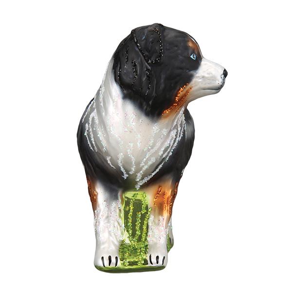 Glass Australian Shepherd ornament with black, white, and tan markings and glitter accents.