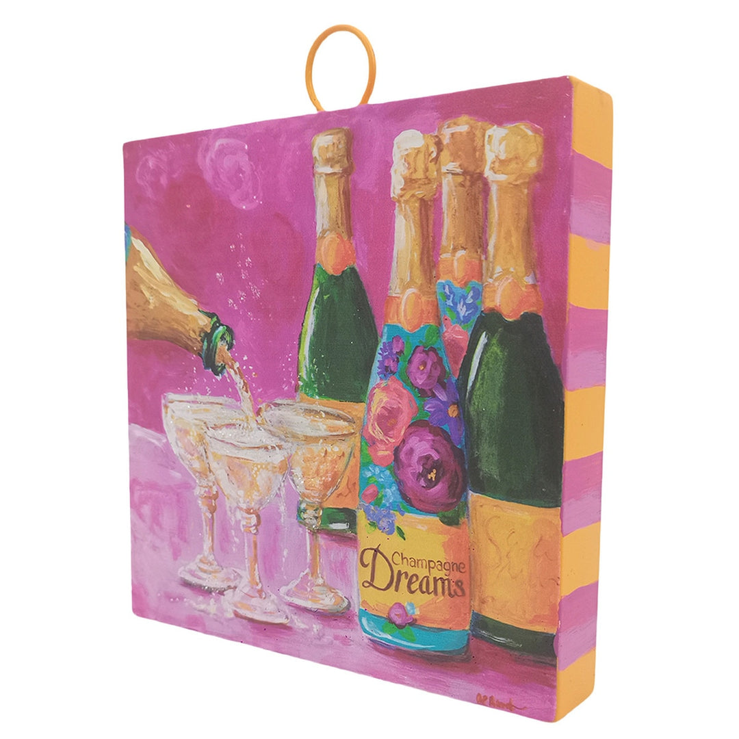 Mini Hamilton Champagne Dreams hanging candle in a clear glass jar with gold accents.