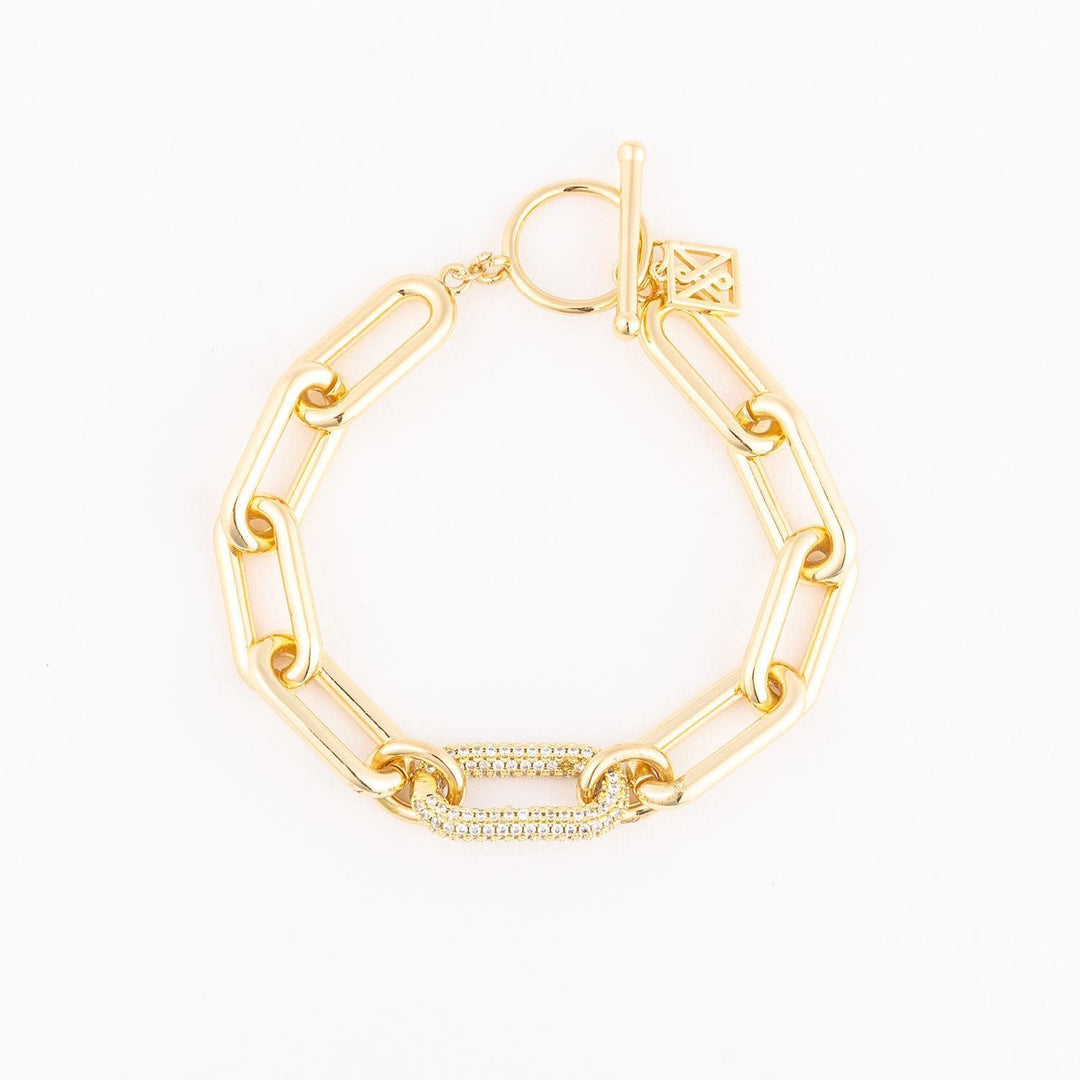 Adaline bracelet: an 18k gold plated chain link with clear cubic zirconia accents and a toggle clasp.
