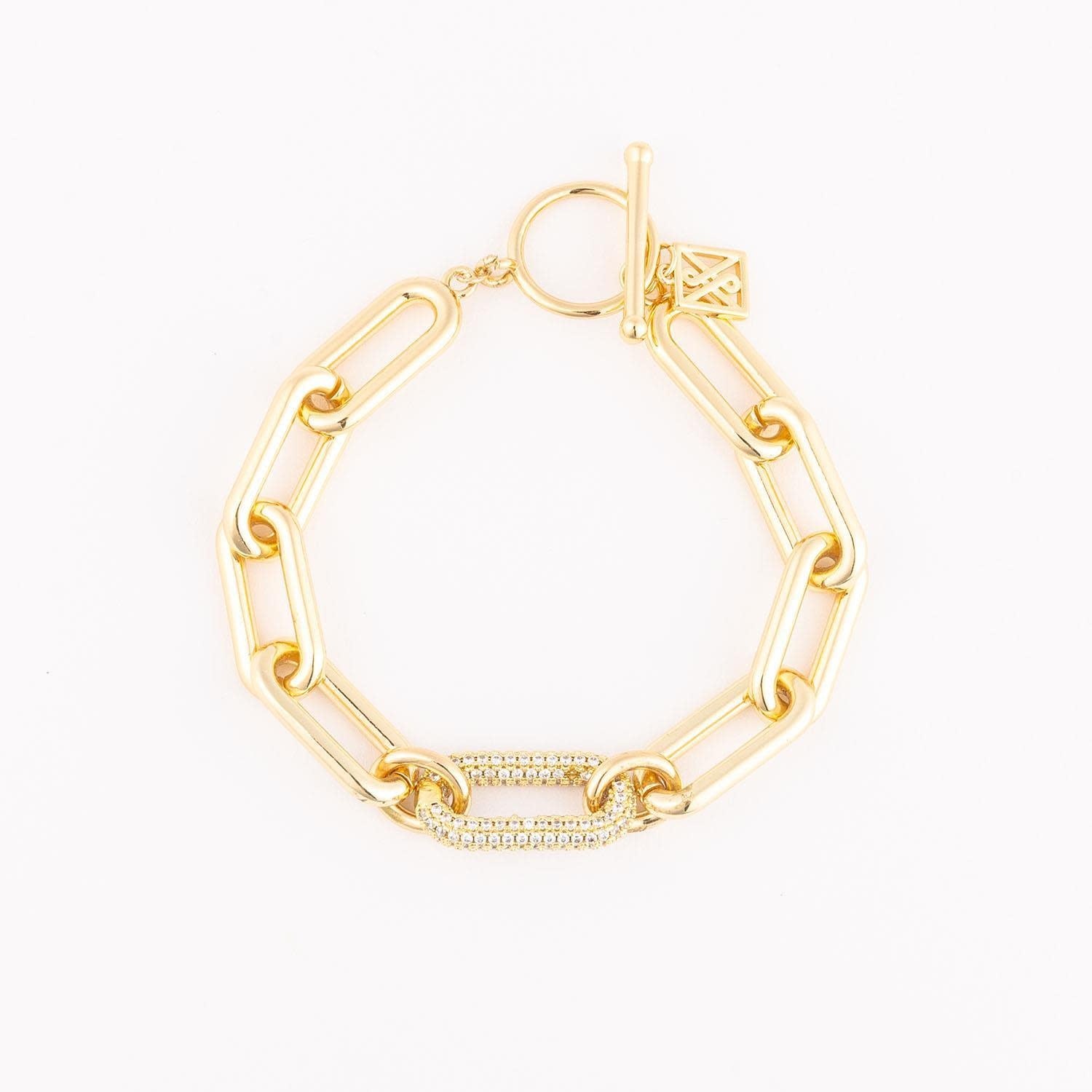 Adaline bracelet: an 18k gold plated chain link with clear cubic zirconia accents and a toggle clasp.