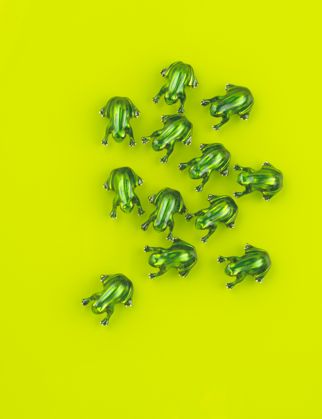 Green Lucky Little Frog charm measuring one inch wide with a whimsical frog silhouette.