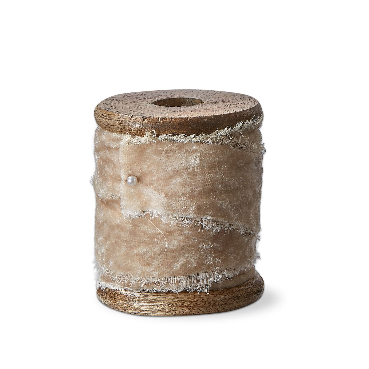 Ivory velvet ribbon spool wrapped around a mango wood stand with an antique pin.
