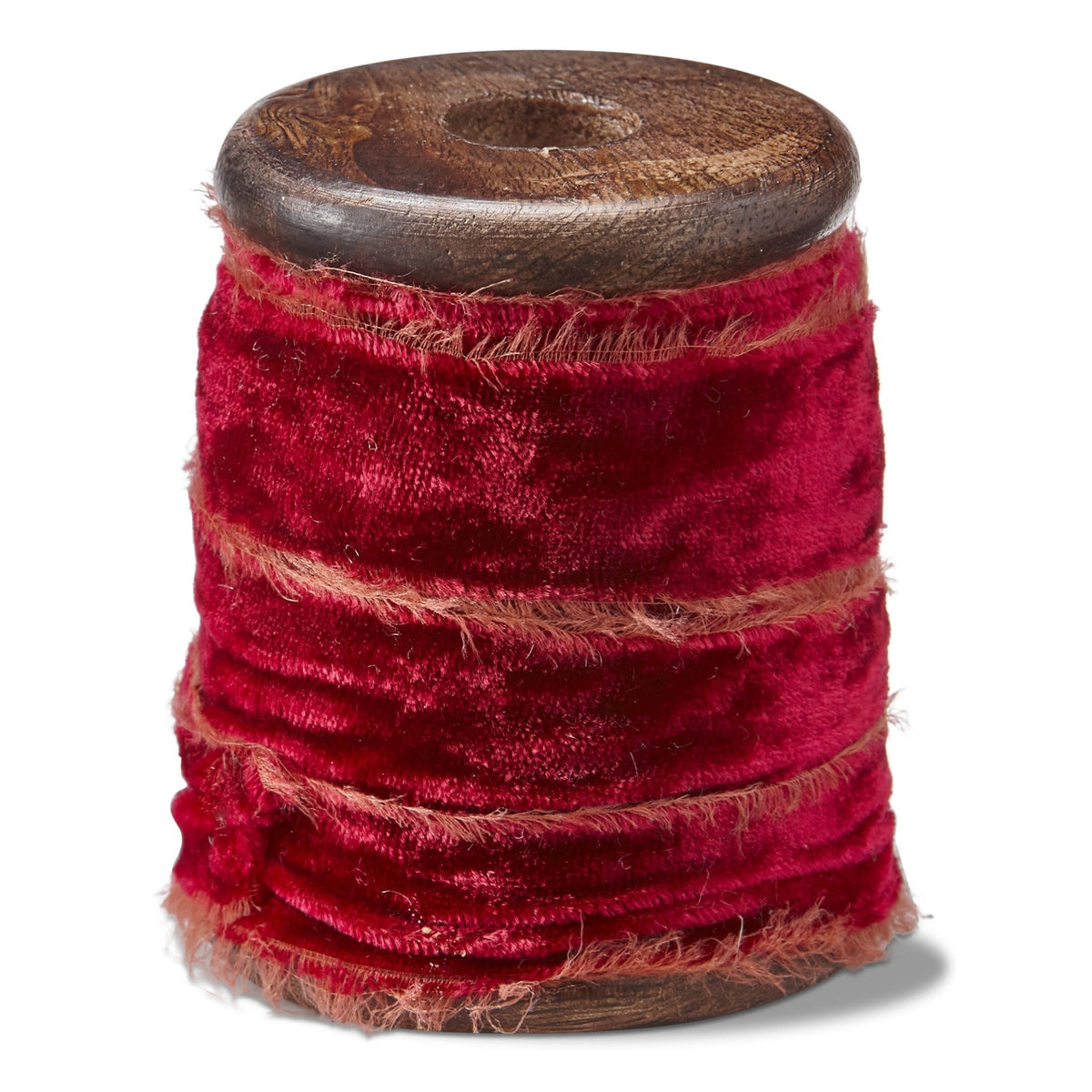 Red velvet ribbon spool on a mango wood stand with antique pin