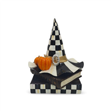 Courtly Check witch hat with black brim on a stack of books