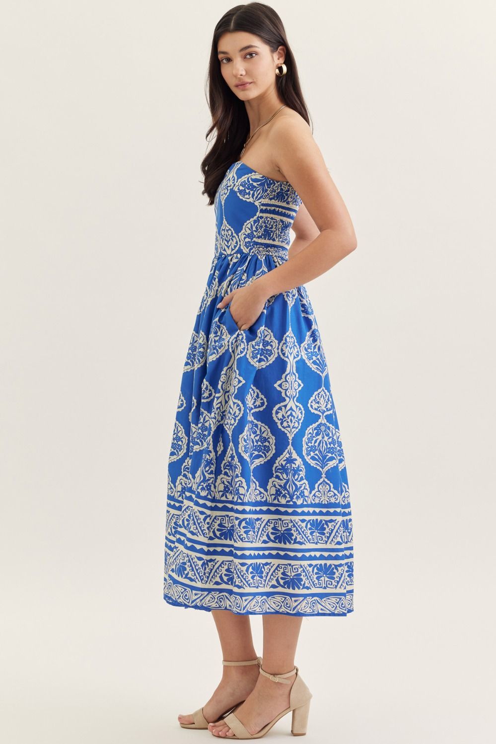 Smocked back strapless midi dress in light blue cotton with side pockets