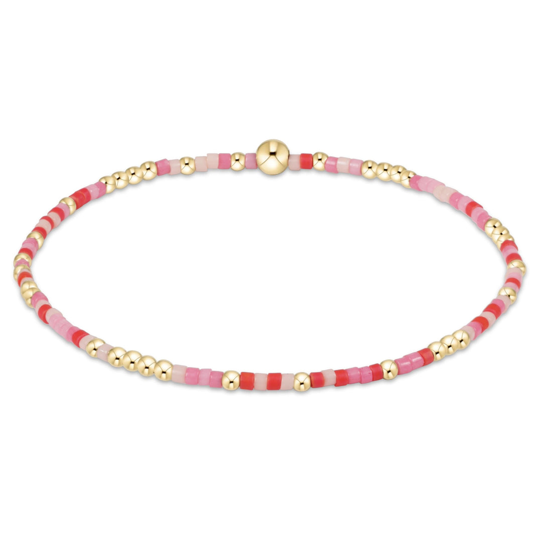 Egirl Hope Unwritten bracelet featuring gold-filled beads with multicolored seed bead accents on stretch elastic.