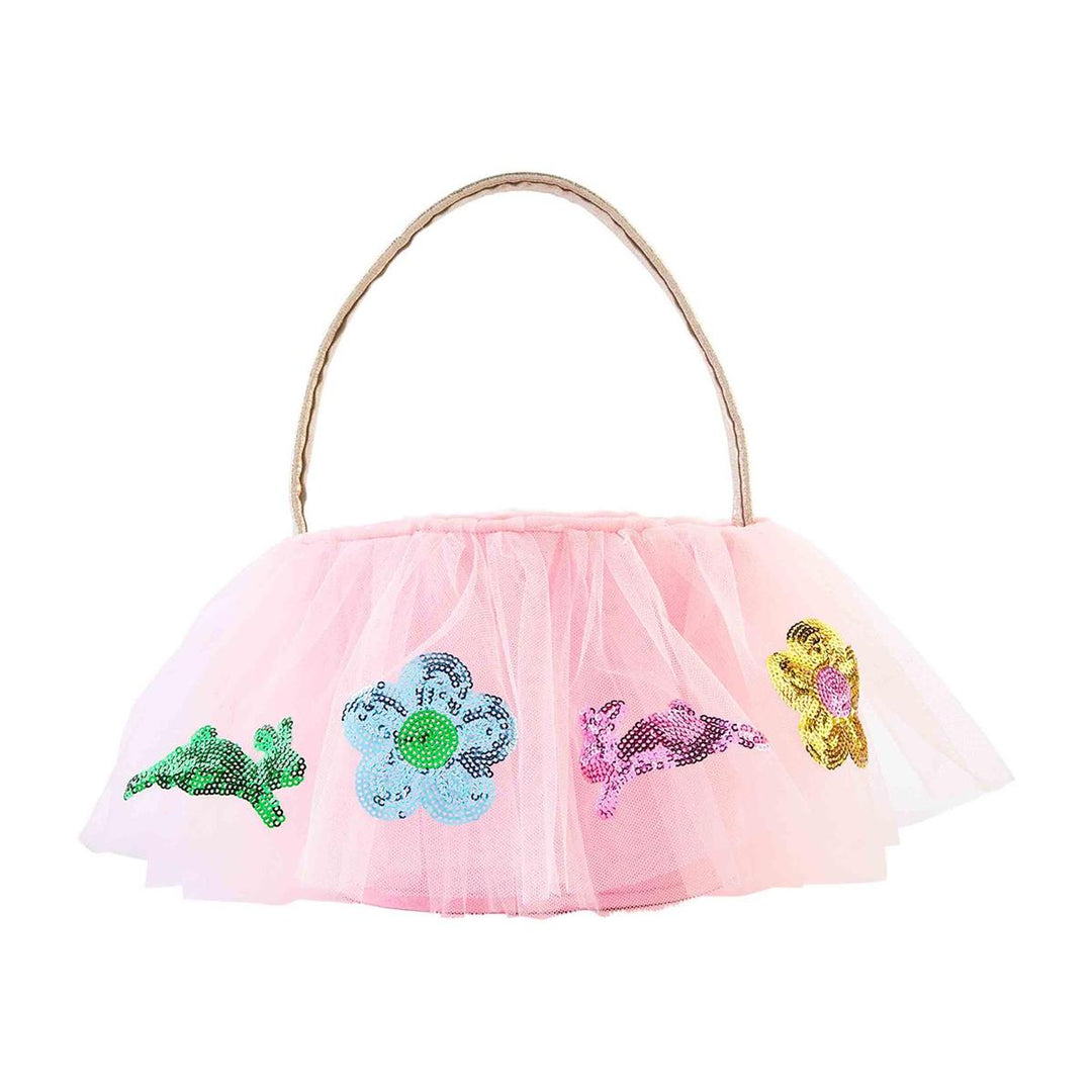 Pink tulle Easter basket with sequined flower and bunny appliques and a gold handle.