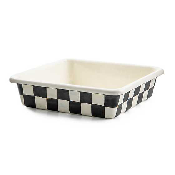 Square enamel baking pan with a black and white checkered pattern on the exterior and cream interior