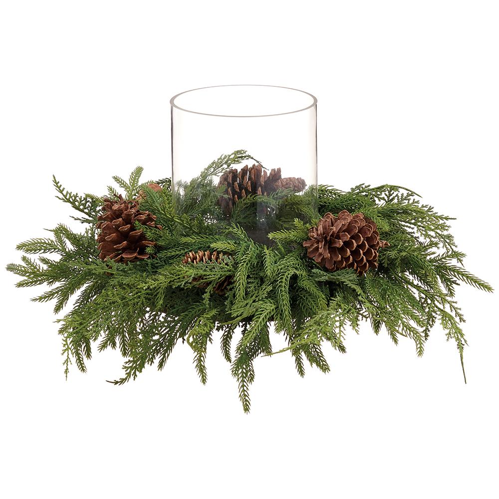 Mixed pine and pine cone centerpiece with a clear glass cylinder vase in the center.