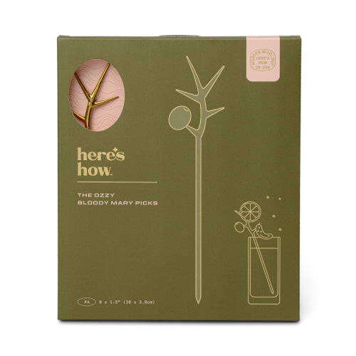 The Ozzy Bloody Mary Picks in gold, packaged in an olive green box with a branch-shaped design.