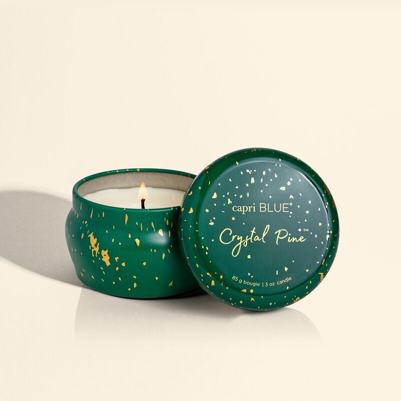 Mini tin candle in Crystal Pine Glimmer with a clear glass jar, silver lid, and subtle shimmering pine needle pattern.