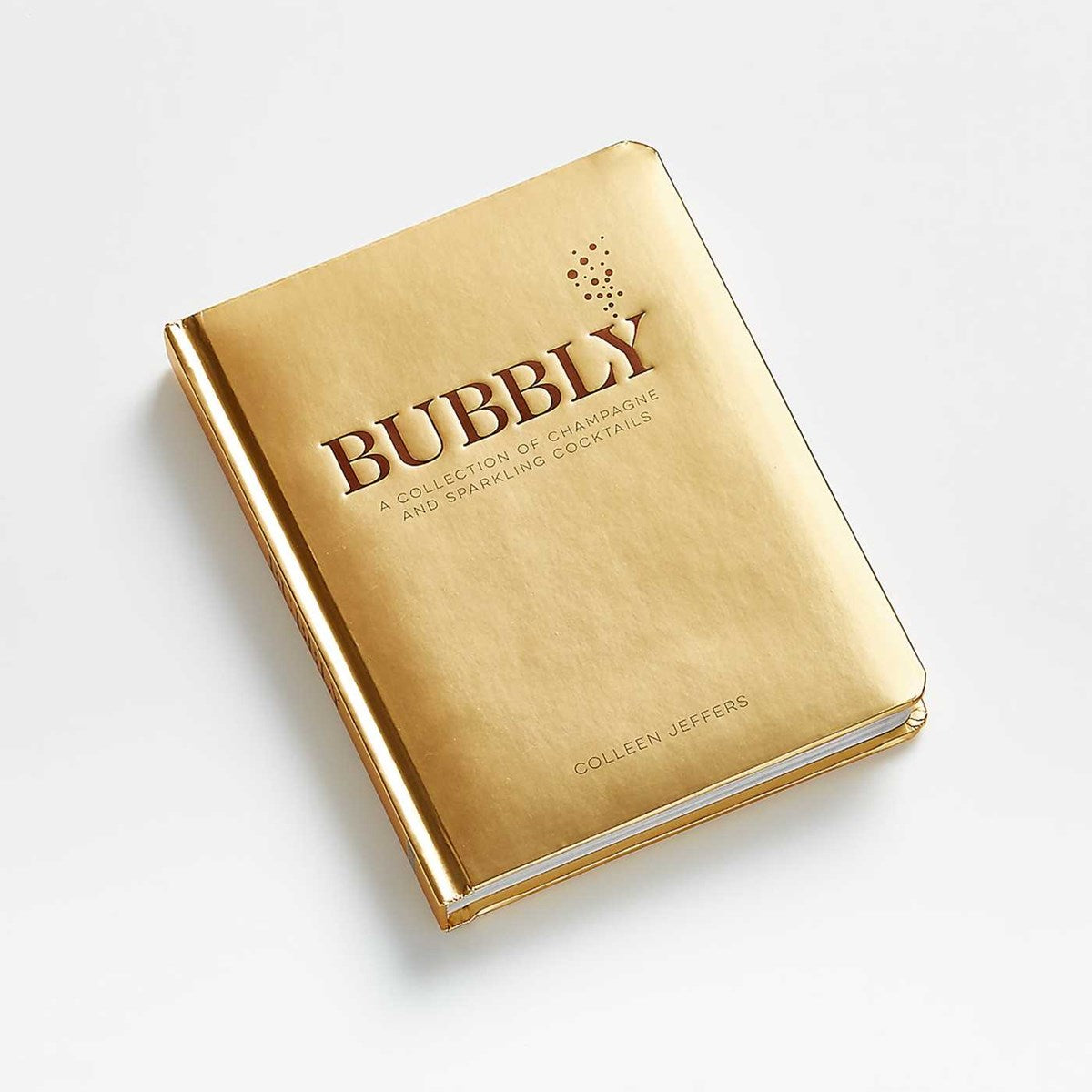 Gold hardcover book titled Bubbly: A Collection of Champagne and Sparkling Cocktails.