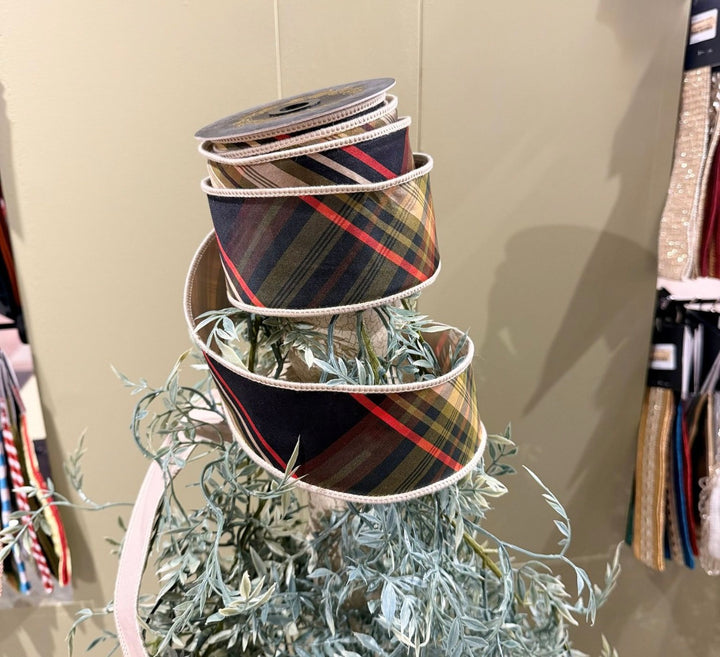2.5 inch Huntington Plaid Taffeta Fused Ribbon with a dark green, red, and gold pattern on a spool.